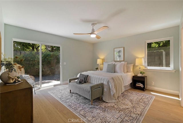 812 Collindale Ct, Chico, CA 95926 - bedroom with access to exterior, multiple windows, and light wood-style floors