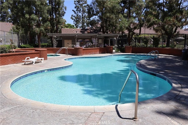 21301 Norwalk Blvd Unit 93, Hawaiian Gardens, CA 90716 - community pool with a pergola and a patio area