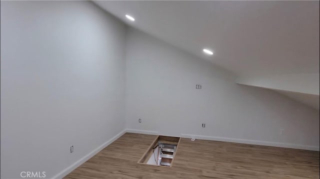 21301 Norwalk Blvd Unit 93, Hawaiian Gardens, CA 90716 - additional living space with vaulted ceiling, wood finished floors, and recessed lighting