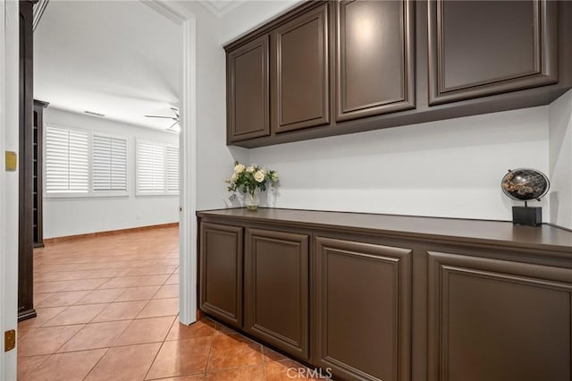 1737 Partridge Ave, Upland, CA 91784 - hallway with light tile patterned floors and baseboards