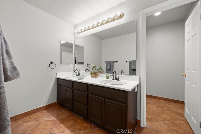 1737 Partridge Ave, Upland, CA 91784 - bathroom featuring double vanity and tile patterned flooring