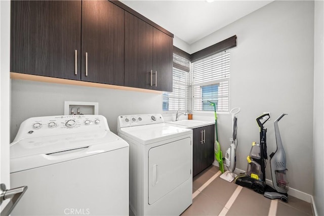 814 Beacon, Irvine, CA 92618 - washroom featuring cabinet space and washing machine and dryer