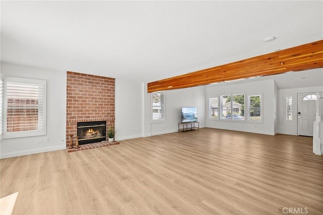 5731 Applecross Dr, Riverside, CA 92507 - unfurnished living room featuring light wood-style flooring and a fireplace