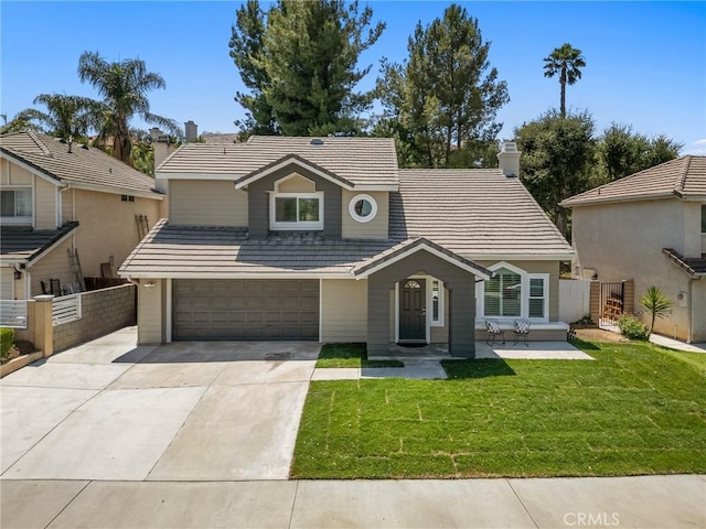 5731 Applecross Dr, Riverside, CA 92507 - traditional-style home with concrete driveway, a tiled roof, an attached garage, and a chimney