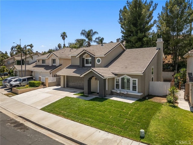 5731 Applecross Dr, Riverside, CA 92507 - view of front of property featuring concrete driveway, a garage, a tile roof, and a chimney