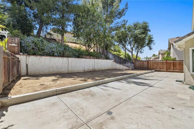 5731 Applecross Dr, Riverside, CA 92507 - fenced backyard with a patio area