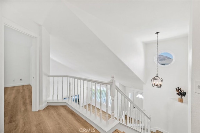 5731 Applecross Dr, Riverside, CA 92507 - hall with a chandelier, wood finished floors, and high vaulted ceiling