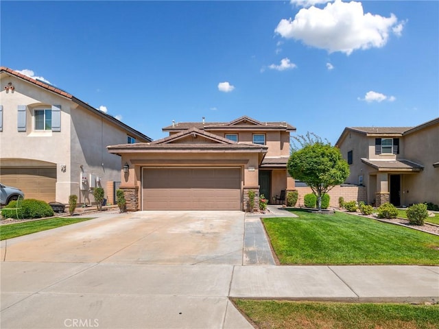 18387 Evening Primrose Ln, San Bernardino, CA 92407 - view of front facade with stucco siding, a front lawn, concrete driveway, a garage, and stone siding