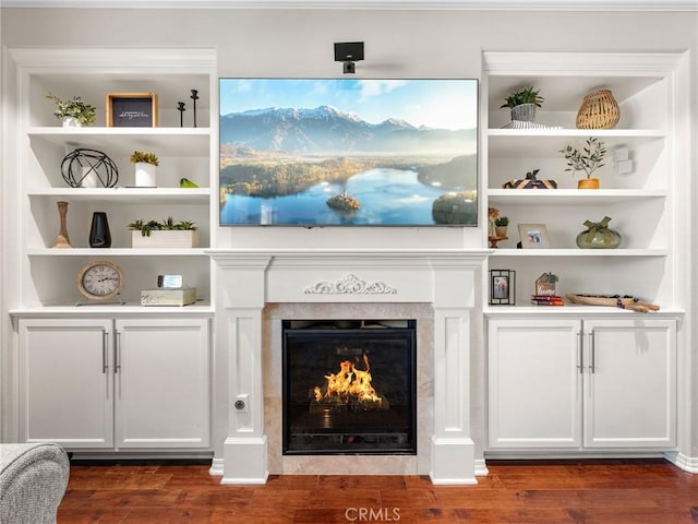18387 Evening Primrose Ln, San Bernardino, CA 92407 - living room featuring dark wood finished floors and a glass covered fireplace