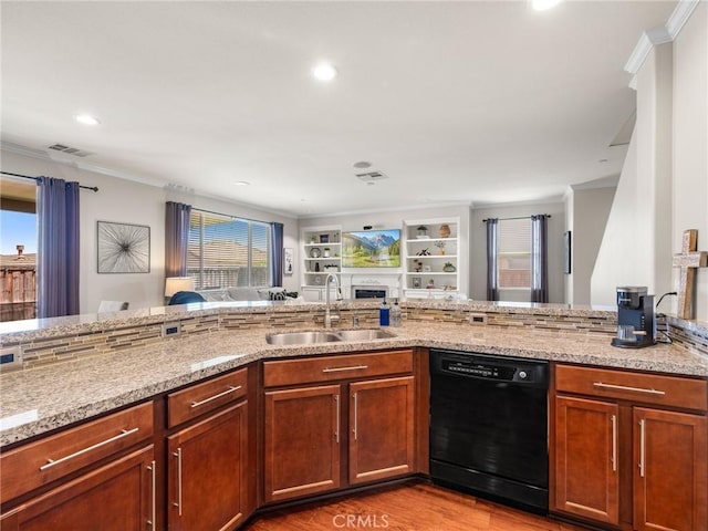 18387 Evening Primrose Ln, San Bernardino, CA 92407 - kitchen featuring dishwasher, crown molding, light stone counters, a fireplace, and open floor plan