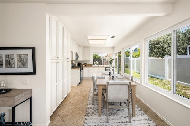 22811 Fortuna Ln, Mission Viejo, CA 92691 - sunroom featuring tile patterned floors and baseboards