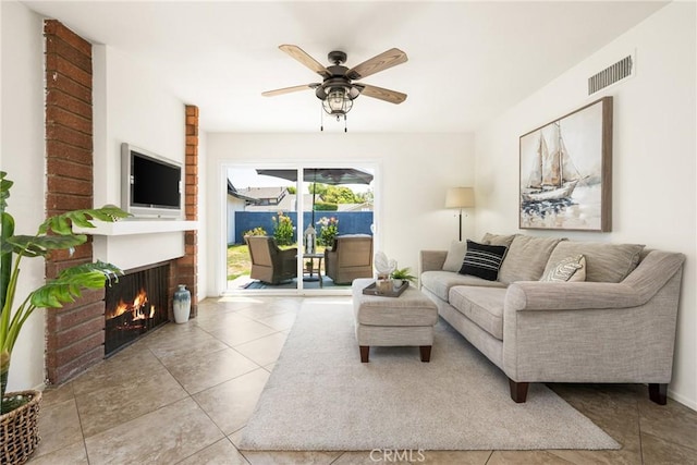 22811 Fortuna Ln, Mission Viejo, CA 92691 - tiled living room featuring a fireplace and a ceiling fan