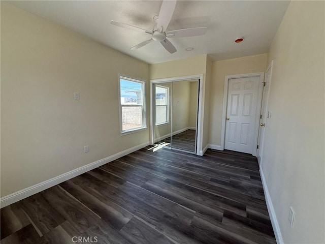 817 Orange Grove Ave, Colton, CA 92324 - unfurnished bedroom with dark wood finished floors, a closet, and a ceiling fan