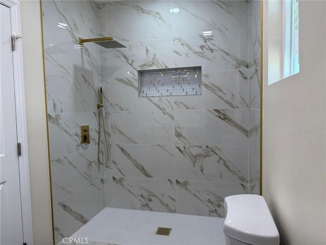 817 Orange Grove Ave, Colton, CA 92324 - bathroom with a tile shower and toilet