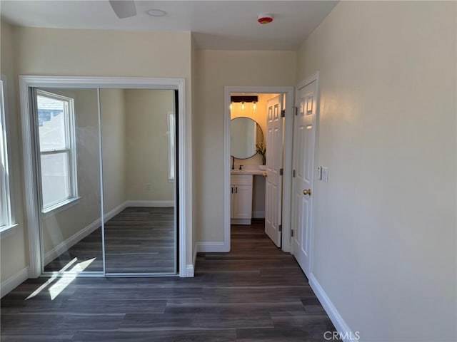 817 Orange Grove Ave, Colton, CA 92324 - unfurnished bedroom with dark wood-type flooring, a closet, and ensuite bath