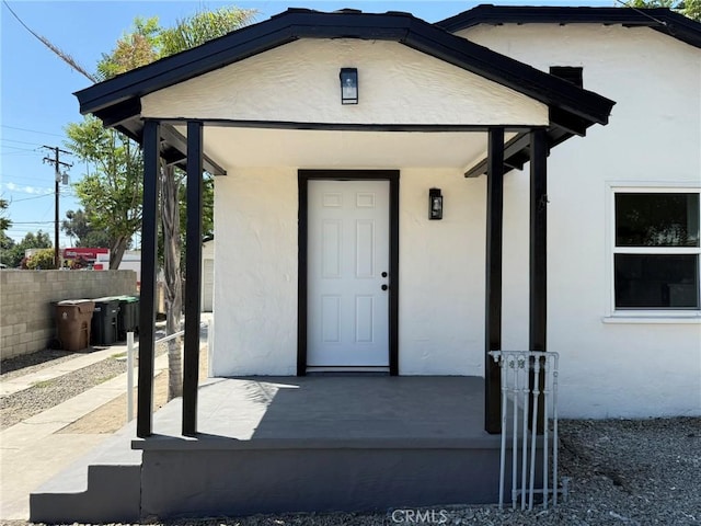 817 Orange Grove Ave, Colton, CA 92324 - entrance to property featuring stucco siding and a porch