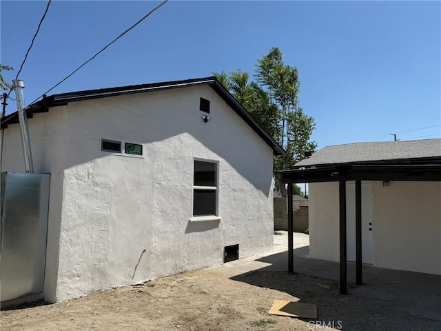 817 Orange Grove Ave, Colton, CA 92324 - view of property exterior featuring stucco siding and a patio