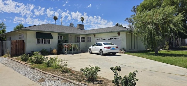 6718 Del Rosa Dr, San Bernardino, CA 92404 - ranch-style home with a chimney, concrete driveway, a garage, and stucco siding