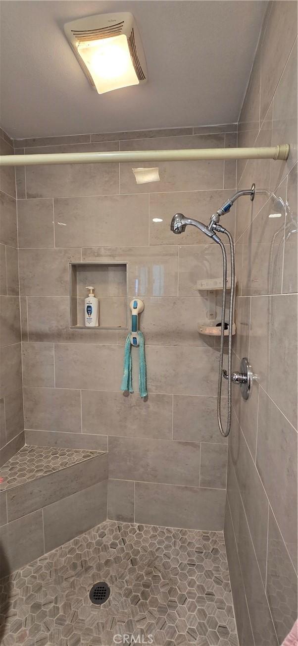 6718 Del Rosa Dr, San Bernardino, CA 92404 - bathroom with tiled shower