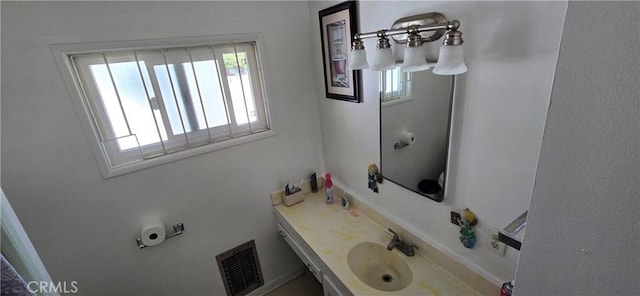 6718 Del Rosa Dr, San Bernardino, CA 92404 - bathroom with plenty of natural light and vanity