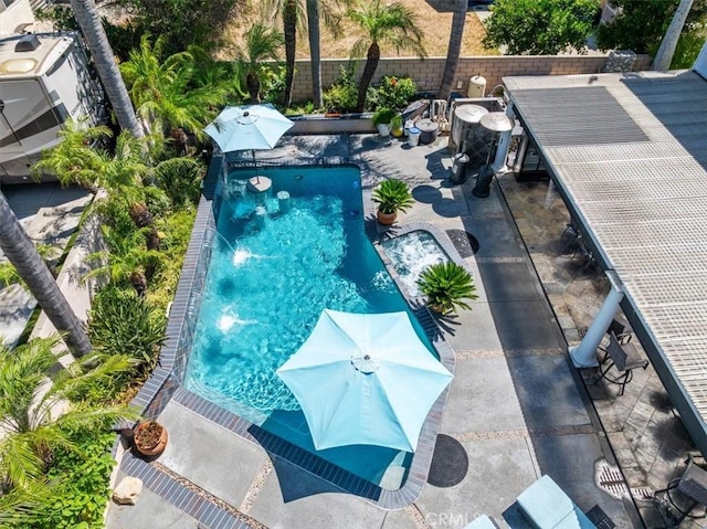 1110 Norcrest St, Corona, CA 92878 - view of swimming pool featuring a patio area