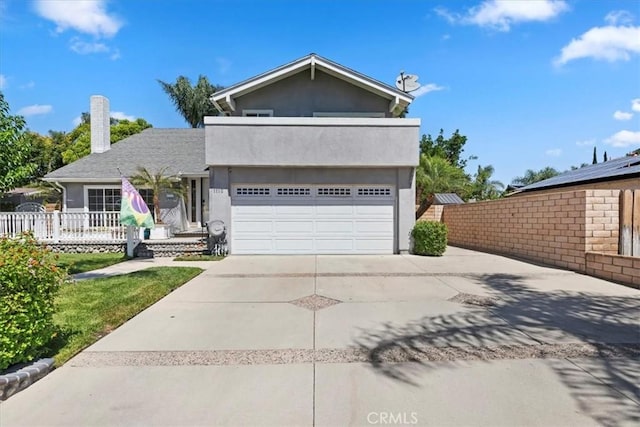 1110 Norcrest St, Corona, CA 92878 - traditional-style home with driveway, a balcony, a garage, a chimney, and stucco siding
