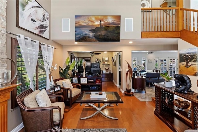 1110 Norcrest St, Corona, CA 92878 - living area featuring a towering ceiling, wood finished floors, and ceiling fan