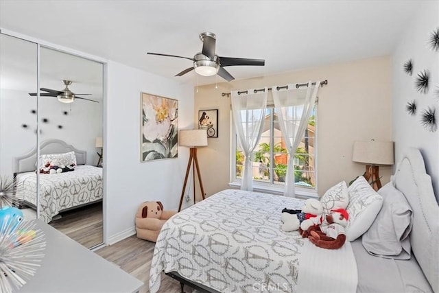 1110 Norcrest St, Corona, CA 92878 - bedroom featuring wood finished floors, ceiling fan, and a closet