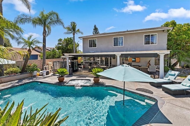 1110 Norcrest St, Corona, CA 92878 - view of pool featuring a jacuzzi, a patio area, and an outdoor hangout area
