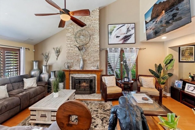 1110 Norcrest St, Corona, CA 92878 - living area featuring wood finished floors, ceiling fan, high vaulted ceiling, and a brick fireplace