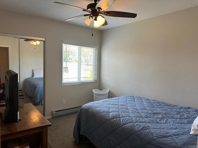 8733 Lake Murray Blvd Unit 6, San Diego, CA 92119 - bedroom with a baseboard radiator, carpet flooring, a ceiling fan, and a closet