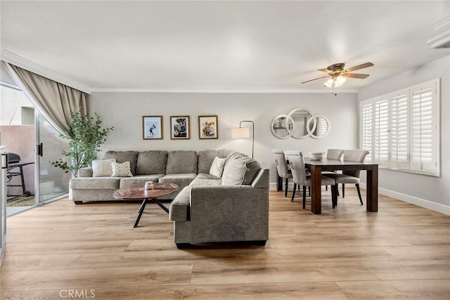 26925 Jasper Unit 210, Mission Viejo, CA 92691 - living room with a ceiling fan, light wood finished floors, and ornamental molding