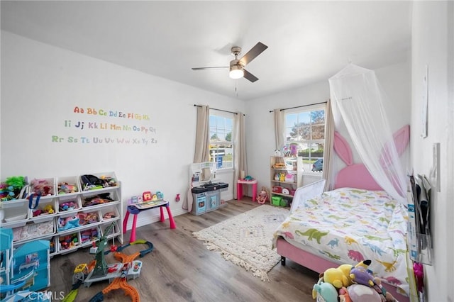 6757 Stephanie Pl, Winnetka, CA 91306 - bedroom with wood finished floors and a ceiling fan