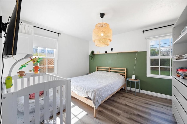 6757 Stephanie Pl, Winnetka, CA 91306 - bedroom featuring wood finished floors and baseboards