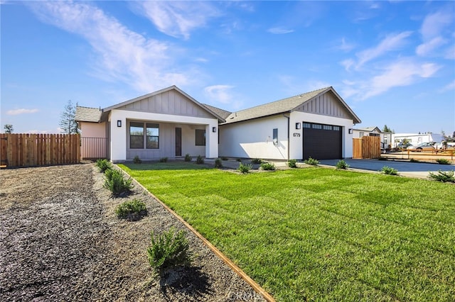 6779 Matell Rd, Paradise, CA 95969 - view of front of house with driveway, board and batten siding, an attached garage, and roof with shingles
