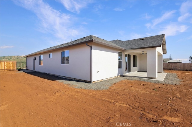 6779 Matell Rd, Paradise, CA 95969 - back of house featuring a patio, a fenced backyard, and stucco siding