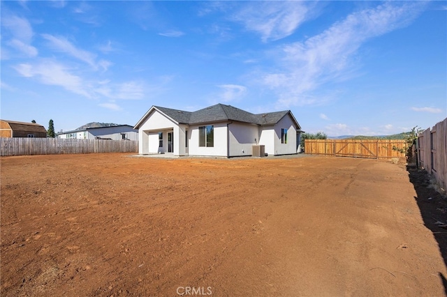 6779 Matell Rd, Paradise, CA 95969 - back of property with stucco siding and a fenced backyard