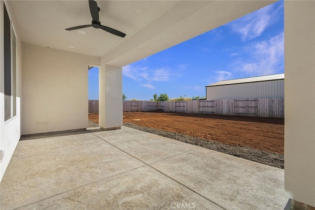 6779 Matell Rd, Paradise, CA 95969 - fenced backyard featuring a ceiling fan and a patio area