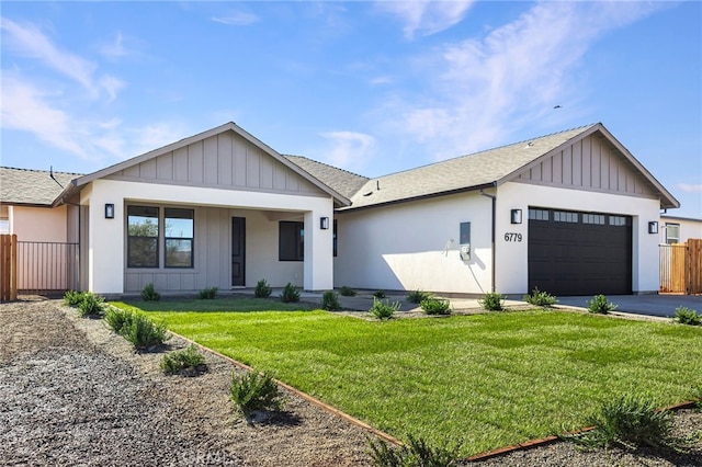 6779 Matell Rd, Paradise, CA 95969 - modern inspired farmhouse featuring a garage, driveway, board and batten siding, roof with shingles, and covered porch