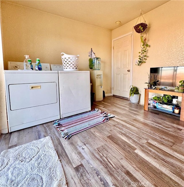 751 Yucca Ave, Barstow, CA 92311 - washroom with separate washer and dryer and wood finished floors