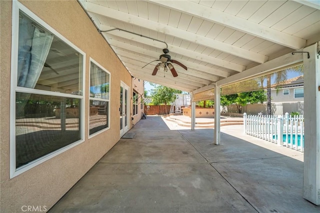 39647 Dartanian Pl, Murrieta, CA 92562 - fenced backyard featuring a patio and ceiling fan