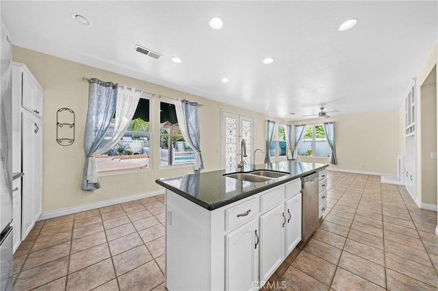 39647 Dartanian Pl, Murrieta, CA 92562 - kitchen featuring dishwasher, dark countertops, white cabinetry, a kitchen island with sink, and recessed lighting