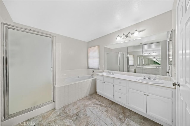 39647 Dartanian Pl, Murrieta, CA 92562 - bathroom featuring double vanity, a garden tub, and a shower stall