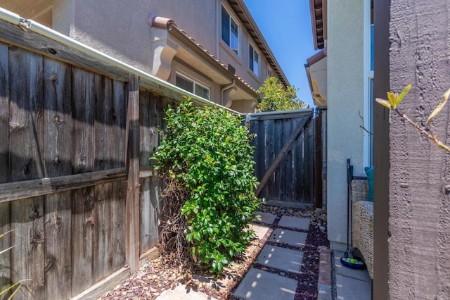2078 Aviata Rd Unit 70, Chula Vista, CA 91914 - view of side of home with a gate and stucco siding