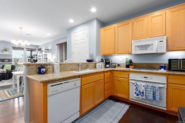 2078 Aviata Rd Unit 70, Chula Vista, CA 91914 - kitchen featuring white appliances, open floor plan, a peninsula, a chandelier, and dark wood-type flooring