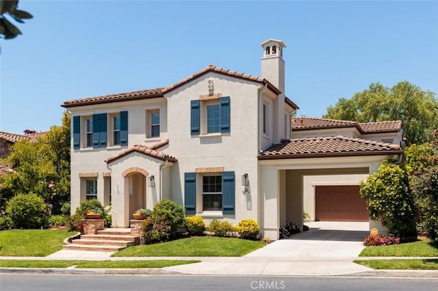 21 Via Nerisa, San Clemente, CA 92673 - mediterranean / spanish house featuring a chimney, driveway, a tile roof, and stucco siding