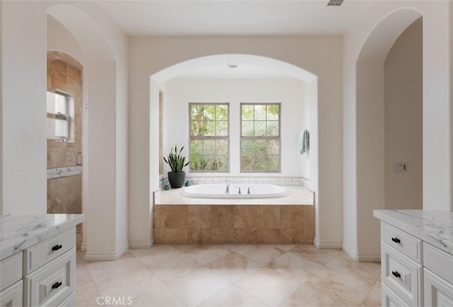 21 Via Nerisa, San Clemente, CA 92673 - bathroom featuring vanity, a garden tub, tile patterned flooring, and tiled shower