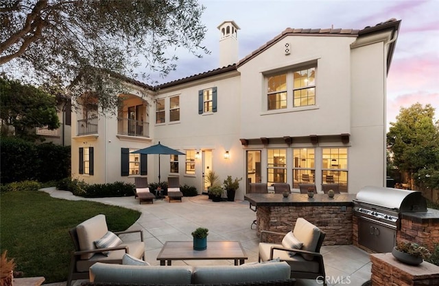 21 Via Nerisa, San Clemente, CA 92673 - rear view of property with area for grilling, a patio area, stucco siding, and an outdoor living space