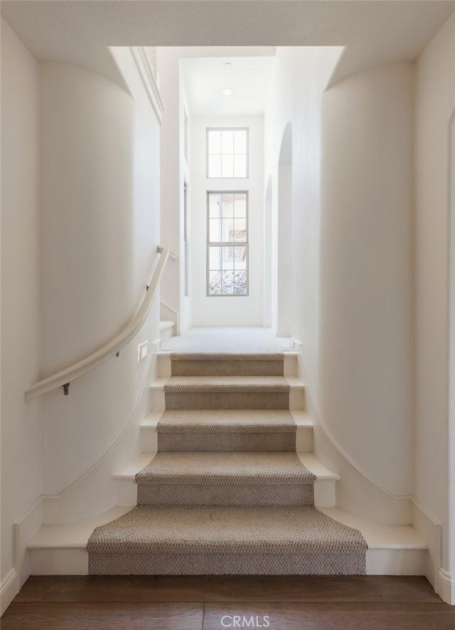 21 Via Nerisa, San Clemente, CA 92673 - stairway featuring wood finished floors and arched walkways