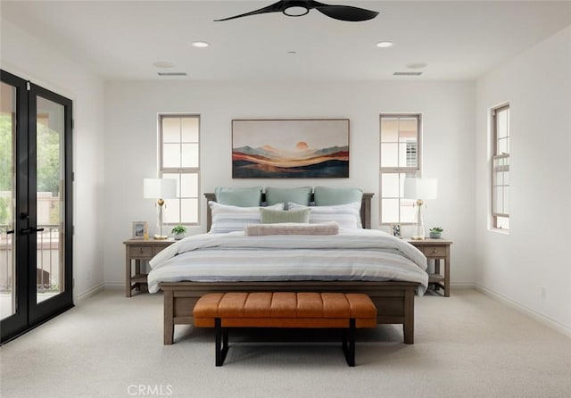 21 Via Nerisa, San Clemente, CA 92673 - bedroom with access to exterior, light colored carpet, french doors, multiple windows, and recessed lighting